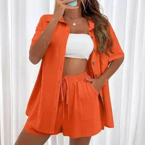 Fashionable two-piece solid color shirt and shorts set for women, casual loose-fitting short-sleeved single-breasted