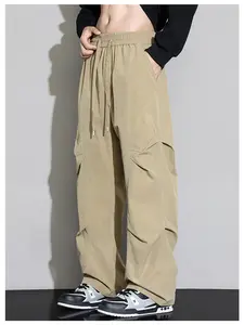 Men’s wide-leg cargo pants, loose fit, drawstring waist, polyester fabric, suitable for everyday wear or casual outdoor activities. Pocket Beige Menswear
