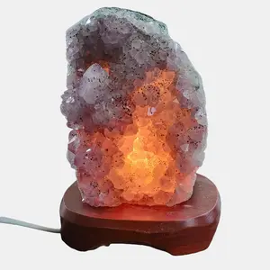 Natural Amethyst Crystal Lamp Decorative Piece with Illuminated Interior on Wooden Base