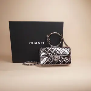 Pre-owned CHANEL leather Mini Bags CC Quilted Metallic Calfskin Mini Top Handle Flap Bag