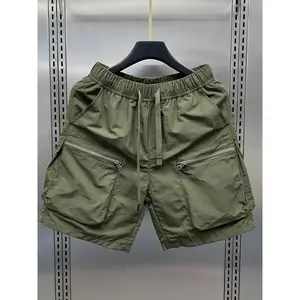 One Japanese retro multi-pocket cargo shorts for men — a lightweight, loose straight-leg casual pair with a 5-inch inseam from a trendy brand, suitable for everyday wear.GARMENTARY