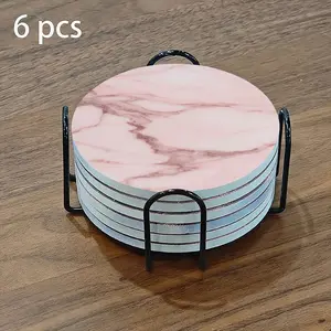 6-piece ceramic coaster set, featuring a light pink marble pattern. Heat-resistant and non-slip coasters, essential for home and dining table decoration, practical and elegant beverage mats, and a perfect housewarming gift.