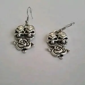 Two Skulls and a Rose Tattoo Style Pierced Earrings