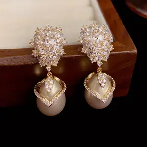 Pair of Vintage Elegance Drop Earrings with  Imitation Pearl Accents, Golden-Tone Alloy Dangle Earrings for Women, Elegant Vintage Jewelry for Daily Wear, Parties, Gift Giving, Party Accessories | Sophisticated Style | Polished Finish, Novelty Earrings