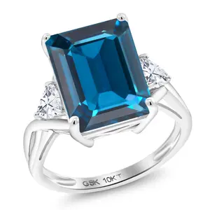 Gem Stone King 10K White Gold London Blue Topaz and White Moissanite 3-Stone Engagement Ring For Women | 9.96 Cttw | Emerald Cut 14X10MM | Trillion 4MM | Available In Size 5, 6, 7, 8, 9