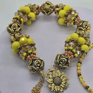 Oshun Ololodi Pulsera Bracelet with Sunflower Pendant and Decorative Beads in Yellow and Brown Tones