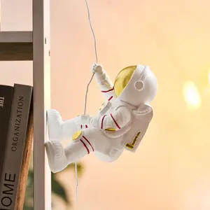 Creative "ins" style astronaut wall decoration piece for bedroom and living room, featuring a three-dimensional space figure on the background wall.