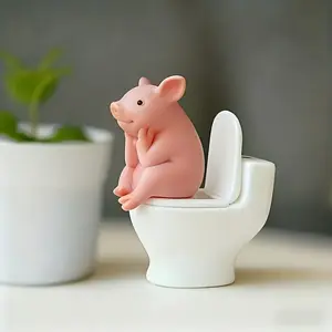 One Adorable Pig Figurine Perched on a Toilet - a PVC Decoration for Your Bathroom, Suitable for Desktop Or Wall Display, Perfect for Home Office Desks And Living Room Decor, As Well As Bathroom Additions And Decorative Statues