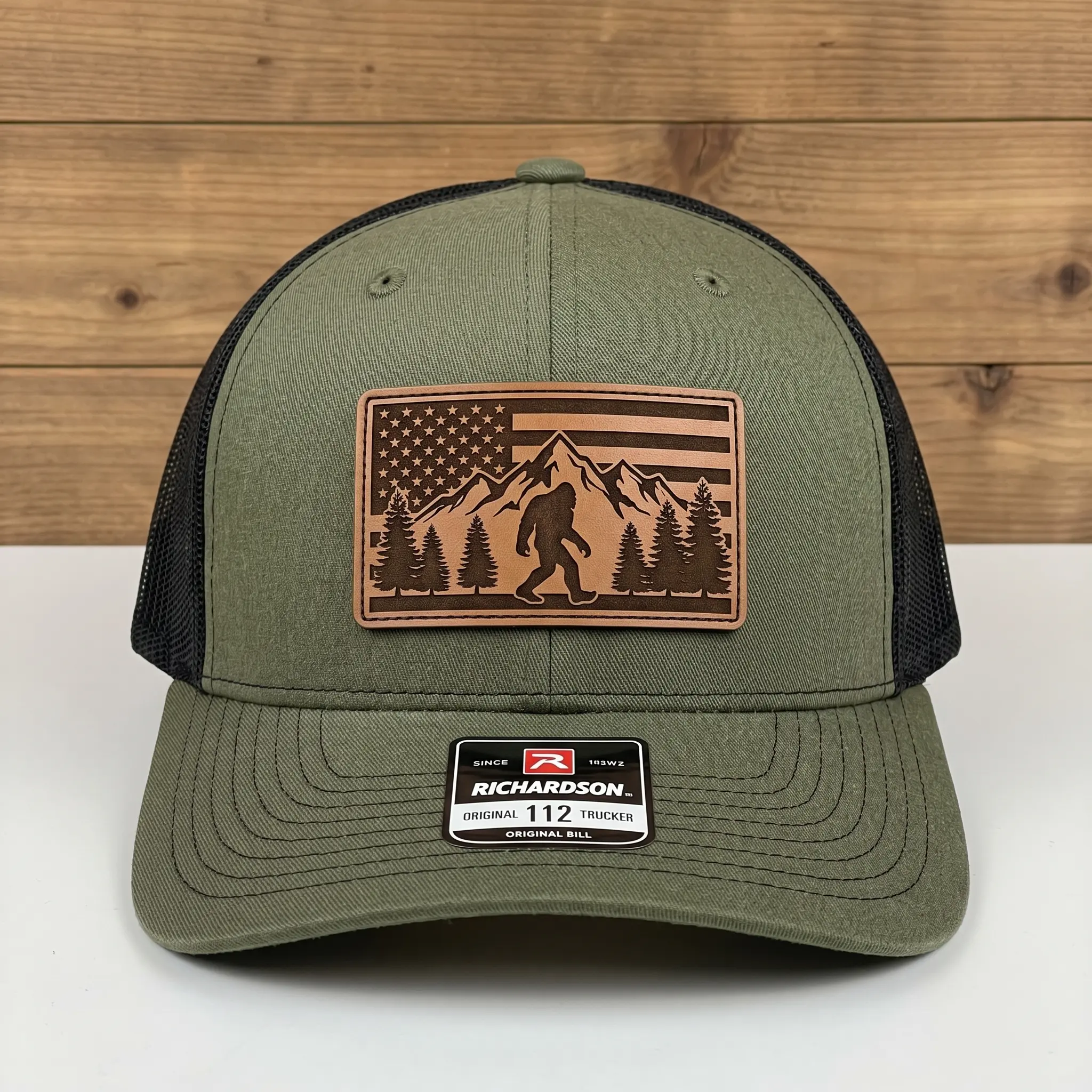 Bigfoot American Flag Leather Patch Hat, Vintage Americana Mountain Forest Trucker Cap, Retro Sasquatch Camping Wilderness Snapback