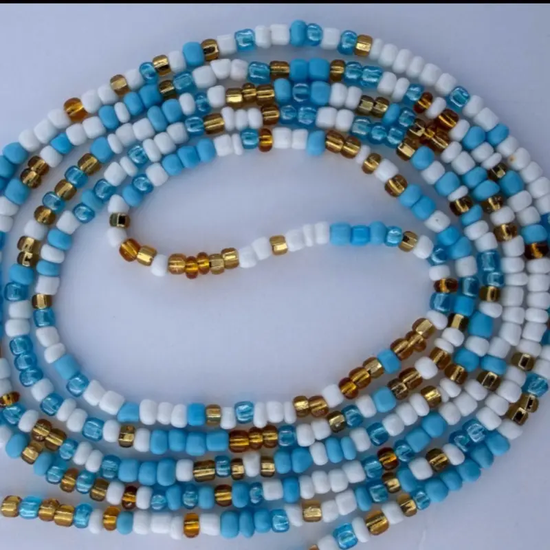 Waistbeads- Cloud 9 Blues, Gold and White it shows two variations permanent and removable. It’s for everyone. Sizing fits all 40 inches to 70 inches which is a small to a 6X