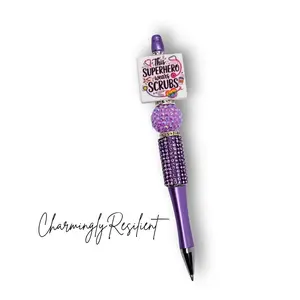 CharminglyResilient Super Hero Wears Scrubs Purple Refillable Pen for Nurses with Rhinestone Accents and Removable Tassel Ideal Gift