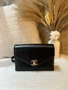 Pre-owned CHANEL Black & Gold Chevron Quilted Envelope Wallet on Chain (WOC) 1919H0708