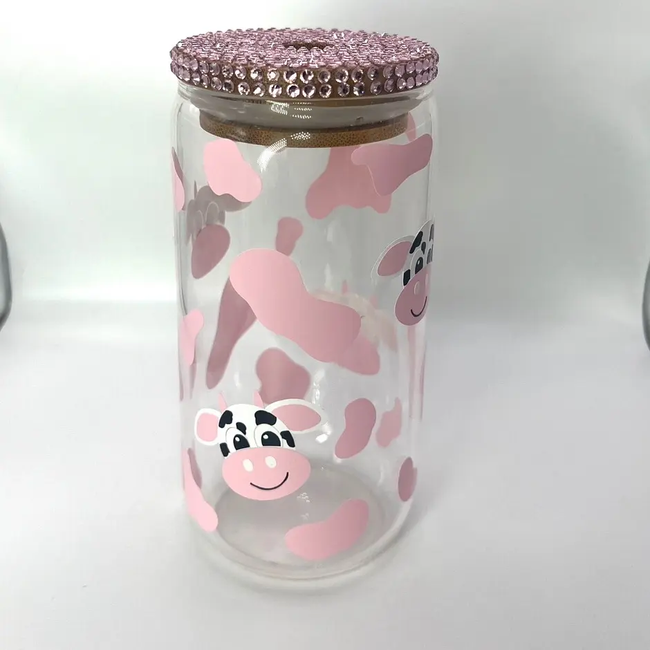 Glass cup with bamboo lid and straw