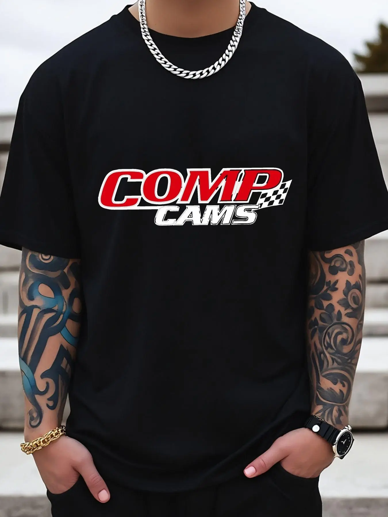 Men's Oversized Print T-Shirt, Black Casual T-Shirt - "COMP CAMS" features a red and white graphic design with checkered flag details. It has a relaxed fit, short sleeves, and is suitable for everyday wear; a versatile style suitable for all seasons.