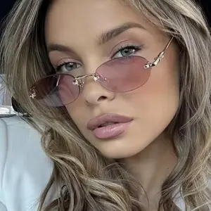 Retro Oval Sunglasses for Men and Women Fashionable Y2K Frameless Narrow Tone Sunglasses with Gold Accents