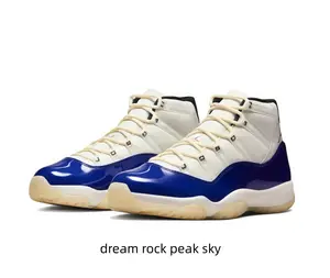 Premium white mesh with that iconic blue patent detail. A total grail