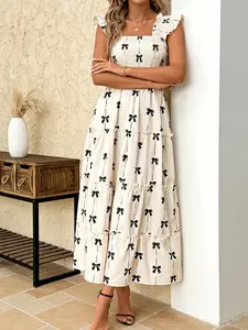 A fashionable Summer white background black bow print dress for women, with a delicate square neckline design and sweet ear ear ear ear shoulder sleeves, suitable for commuting to work, shopping, and outdoor Casual Wear Womenswear
