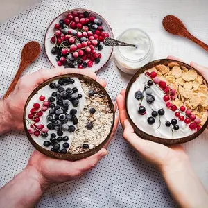 8 piece set of coconut bowls and wooden spoons is crafted from coconut shells and serves perfectly as salad or smoothie bowls. Complete with wooden spoons, it makes an ideal gift for the kitchen and is perfect for serving food.