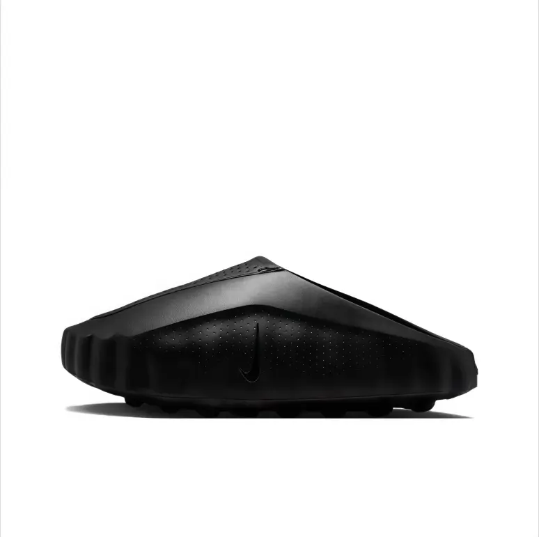 Slip on clog slides black molded perforated upper rugged sole futuristic silhouette comfy beach footwear street fashion vacation essential unisex casual outdoor slides