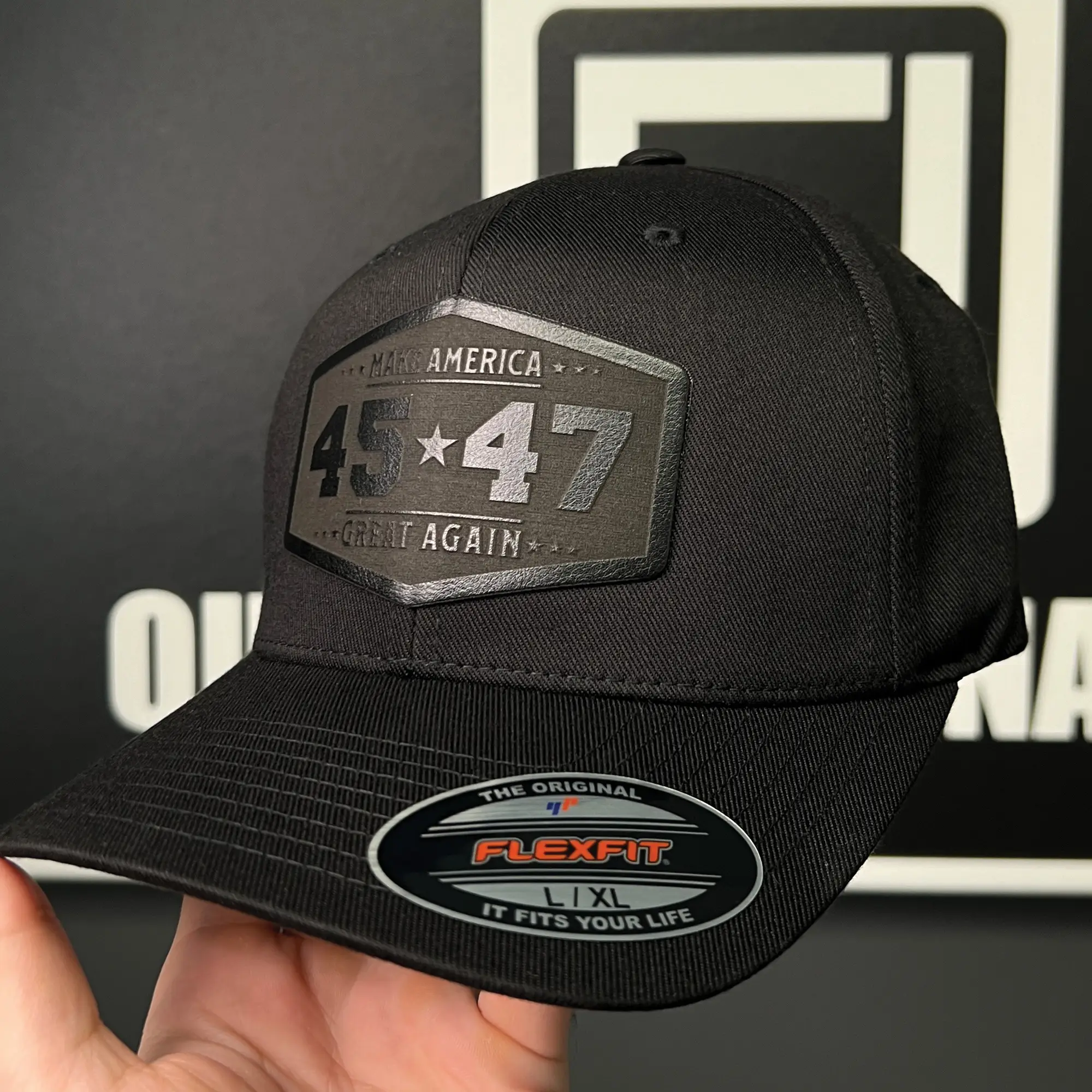 45/47 Flex Hat with American Flag Key Tag. "Black Hat Black Patch"