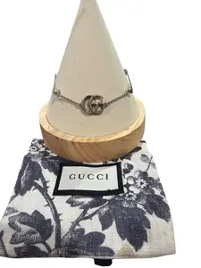 Pre-owned Gucci Interlocking Gucci" with Flower Charm Silver Bracelet (7.75 in.) with Dust Bag Perfect for Daily Use