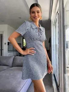 Spicy Coquette Black & White Gingham Plaid Tie-Front Peter Pan Collar Puff Sleeve Fit & Flare Short Mini Dress Vintage French Black & White Gingham Plaid Tie-Front Peter Pan Collar Puff Sleeve Cottagecore Short Mini Dress