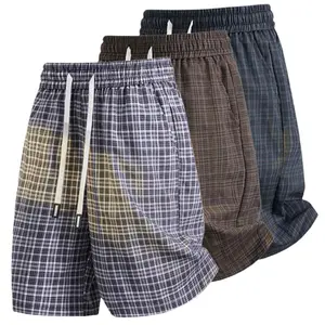 New summer men’s shorts featuring American retro plaid and an elastic drawstring waist; breathable and comfortable for home wear, outdoor activities, fitness, and the beach—vacation style.