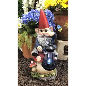 Ebros Large Whimsical Big Eyed Mr Gnome Sitting On Giant Toadstool Mushroom Holding Out Solar LED Lantern Light Statue 15" Tall for Patio Garden Lawn Home Decor Gnomes Figurine
