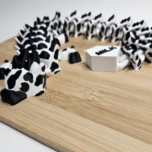 Cow dragon designed by Studioambo printed by Time2dezign3d:  The artwork features a cow dragon, a striking combination of cow and dragon elements