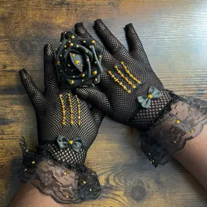 Black and Gold Lace Gloves with Embellished Rose and Bow Details for Elegant Occasions