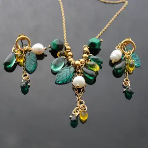 Handmade beaded jewelry with natural pearl, amethyst, glass and 18K gold plated stainless steel