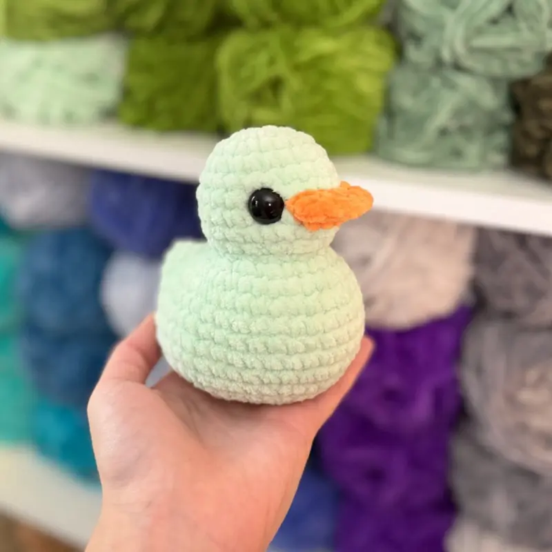 Hand-crocheted green rubber duck
