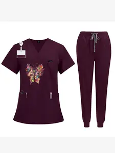 Set of 2 Brown V-Neck Medical Scrub Tops for Men & Women, Featuring a Unique and Vibrant Multi-Color Splatter Butterfly Design.