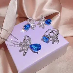 Blue Zircon Jewelry Set: Platinum Plated Brass, Bow Necklace & Earrings set