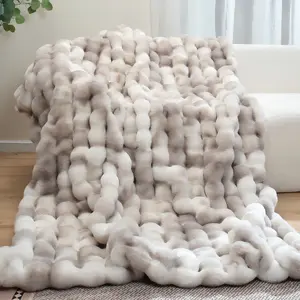 Ultra-Soft Bubble Blanket: Plush, breathable & durable. Perfect for couch, bed & travel. Machine washable. A cozy essential.