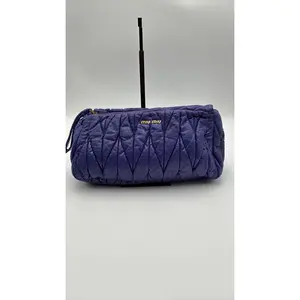 Pre-owned Leather Luxury Bags & Accessories Miu Miu Matelasse Clutch, Purple Date Code: NODC05292604. Entrupy ID: .