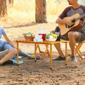 Portable folding bamboo beach table, lightweight and foldable, dimensions are 26.9X 27.2inch, comes with a storage bag, suitable for picnics and camping, can be used both indoors and outdoors
