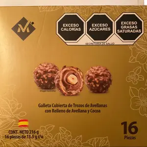 Delicious chocolate ball with hazelnut and cookie crumbs. Box with 16 pieces