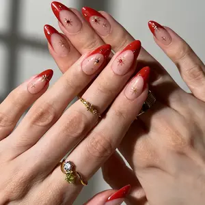Red Celestial Press-On Nails - Glossy Nude Base with Fiery Red Tips & Celestial Gold Accents for Glamorous Manicures