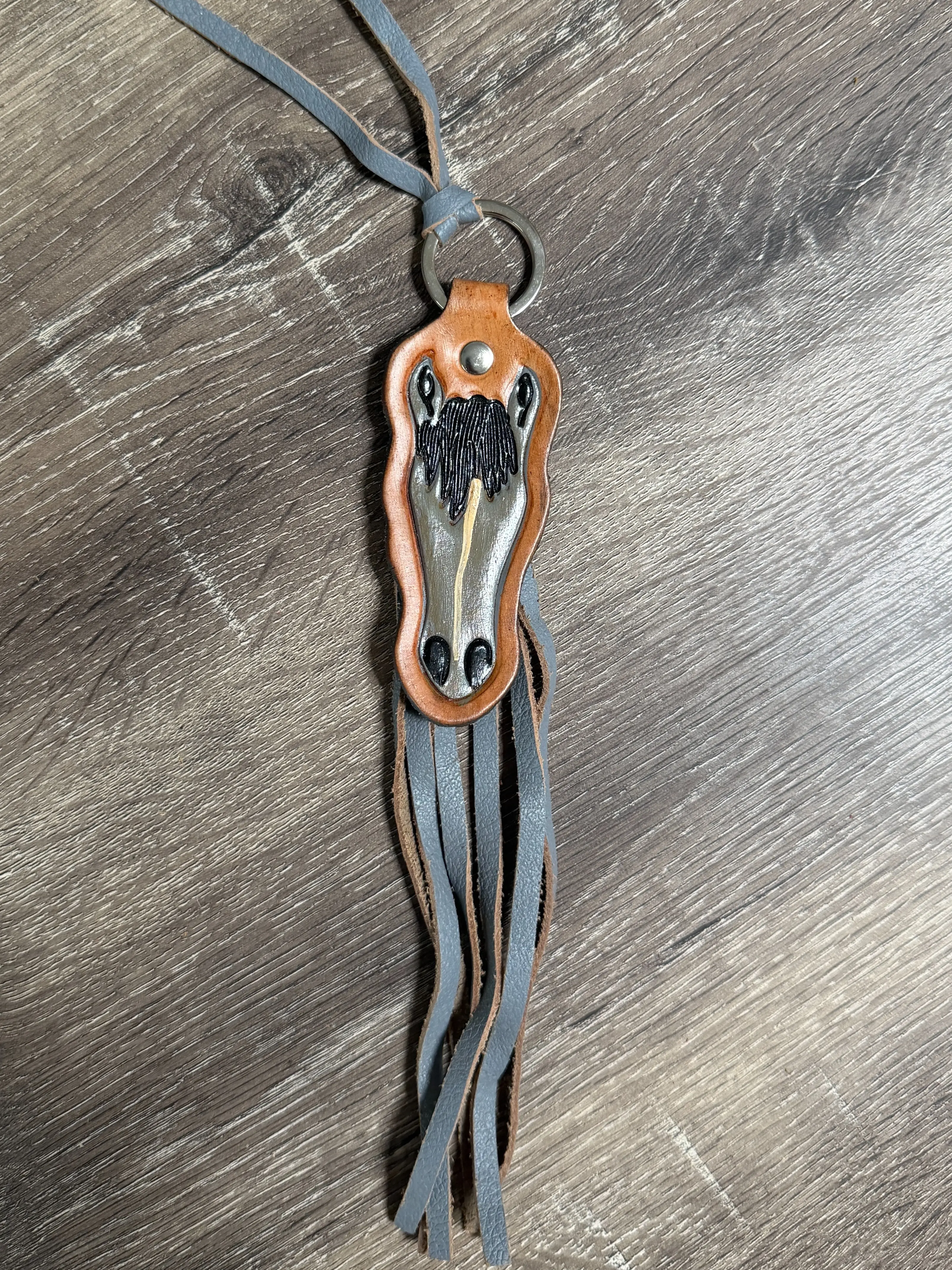 Grey leather horse fringe keychain