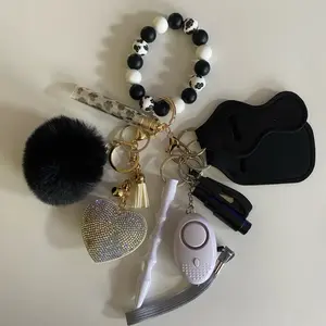 8 Piece Keychain Accessory Set with Beaded Bracelet Heart Charm and Fuzzy Pom Pom for Stylish Keyring
