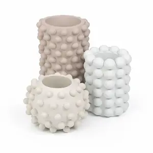 Maren Modern Minimalist Handmade Concrete Bubble Cylinder and Round Planter Set Maren Modern Minimalist Handmade Concrete Bubble Cylinder and Round Planter Set