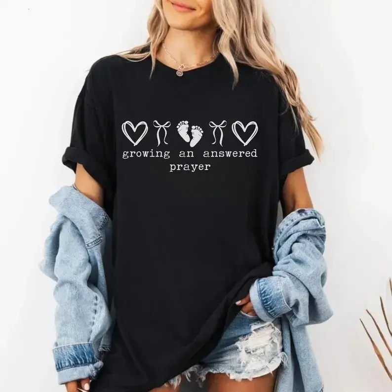 Casual Short-Sleeve Graphical Christian Mom Coquette T-Shirt - Growing Answered Prayer Pregnancy Reveal Announcement, Mom-To-Be Apparel, Baby Shower Gift, USA-Made Sports Top