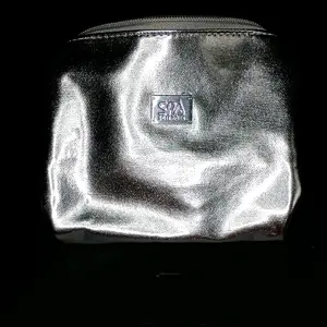 Spa Sciences Limited Edition Makeup Bag-Silver
