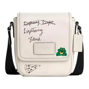 COACH Lucas Sketch 15 Mini Crossbody Bag in White with Magnetic Closure and Calfskin Leather
