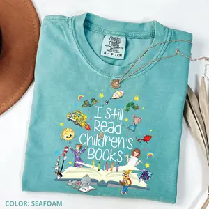 Comfort Colors “I Still Read Children’s Books” T-Shirt – Funny School & Kindergarten Teacher Tee, Cute Back-to-School Outfit, Fun Teacher Gift for Women