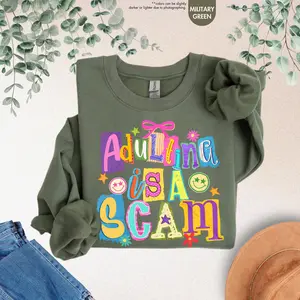 [SALE UP TO 50% + FREE SHIP] Adulting Is A Scam Sweatshirt, Sarcastic Graphic Hoodie, Funny Saying Sweater, Funny Mom Gift, Humorous Women Sweater, Adulting Quote Hoodie
