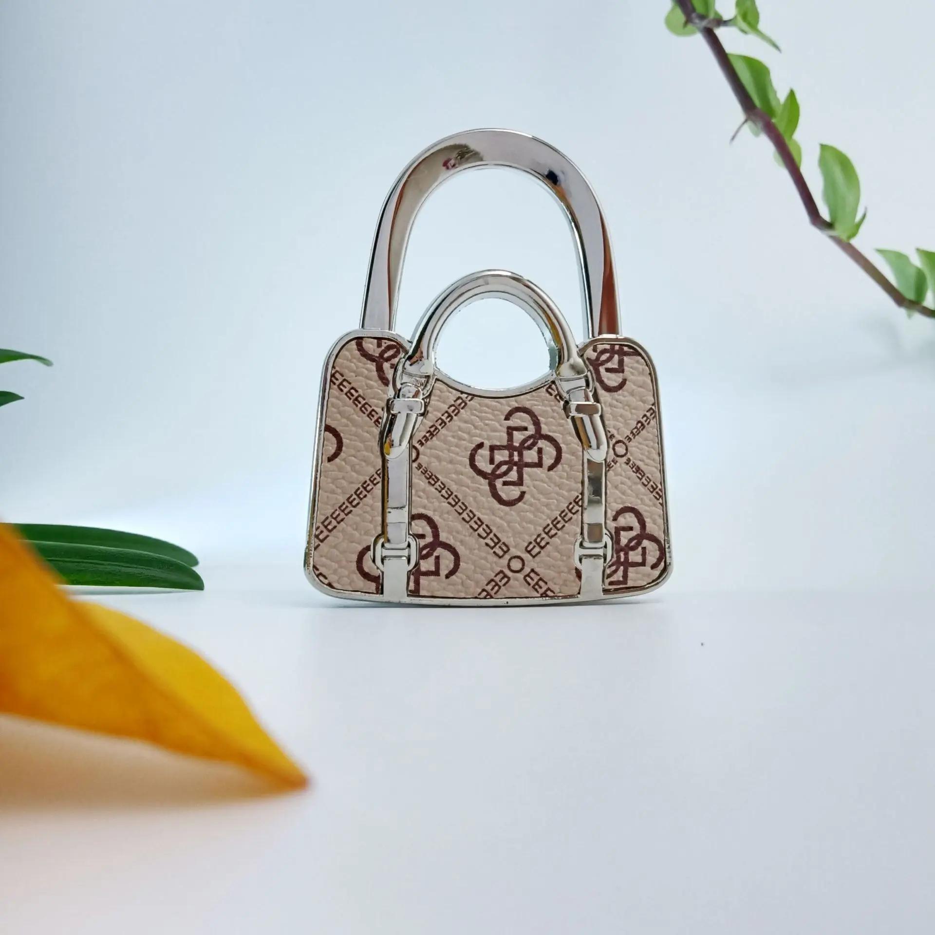 Foldable Camping Purse Hook, Portable Table Edge Bag Hanger for Outdoor Picnic and Travel, Compact Handbag Holder with Leather Pad, Space-Saving Organizer Gift for Women