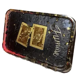 Decked out in sleek black and glimmering gold, this isn't just a tray, it's a statement piece. Handmade with love and crafted from resin, it's durable, functional, and one-of-a-kind. Ready to up your game? Make it yours today. Only from FUMALE.