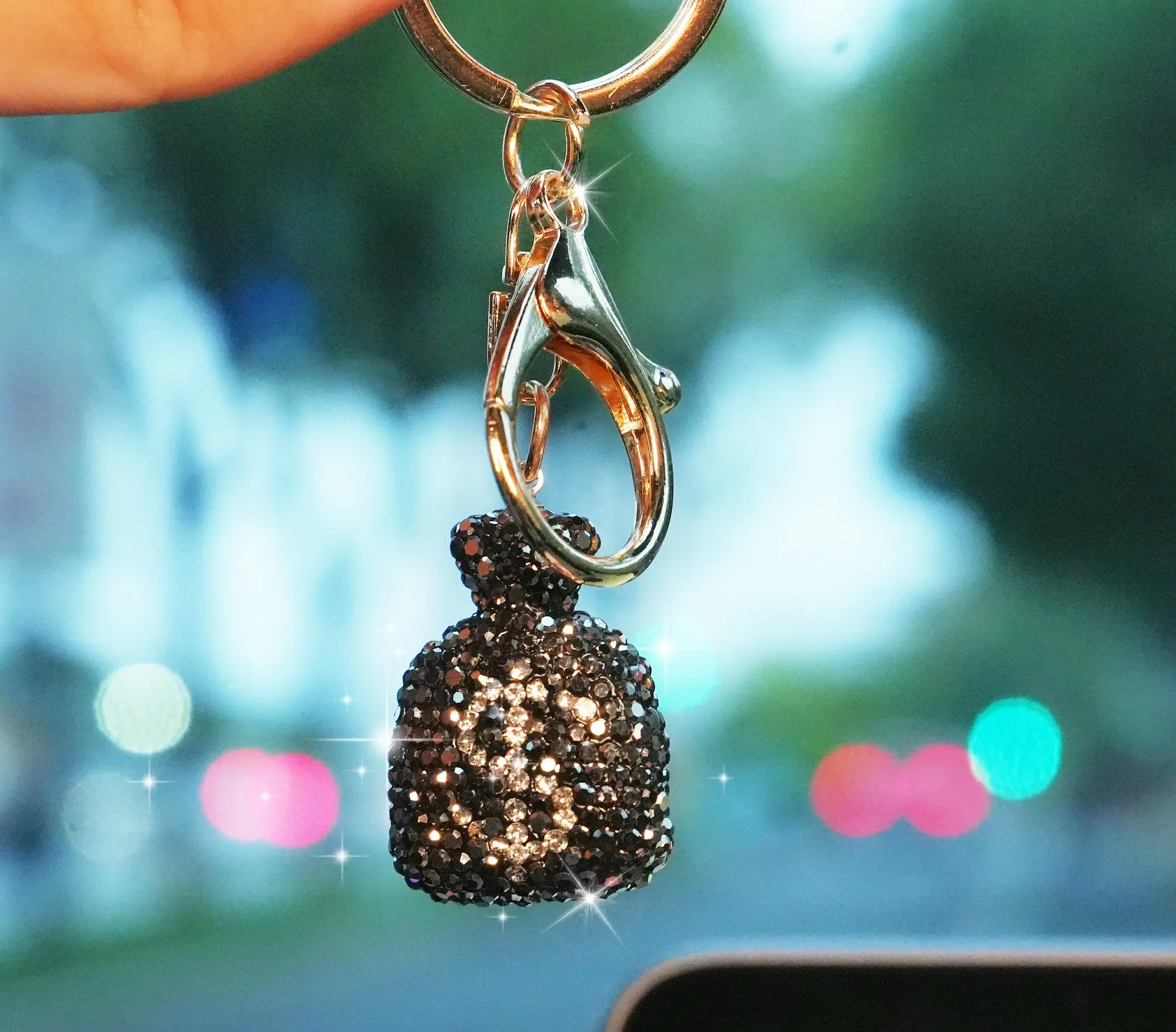 Shiny Lucky Charm Keychain – Crystal Lucky Bag Keychain – Faux Dollar Design with Rhinestone Detailing, Bling Pendant for Rearview Mirror, Handbag, or Gift